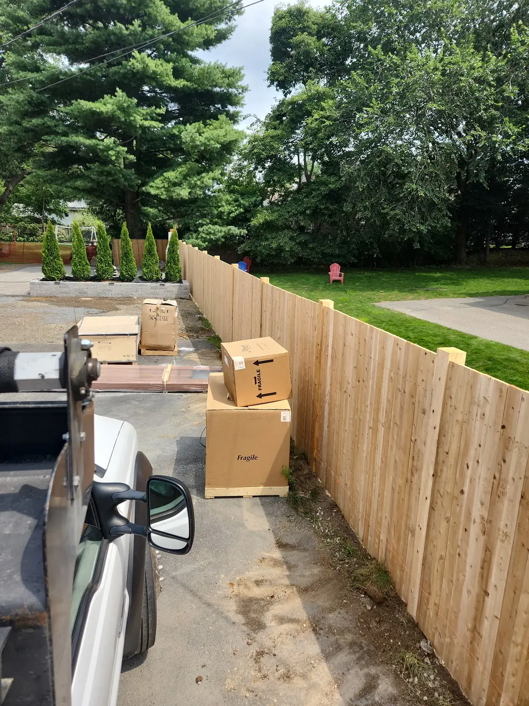 New cedar privacy fence enclosing a residential yard